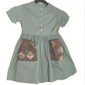 1950s girls dress.  Rather Dowdy.